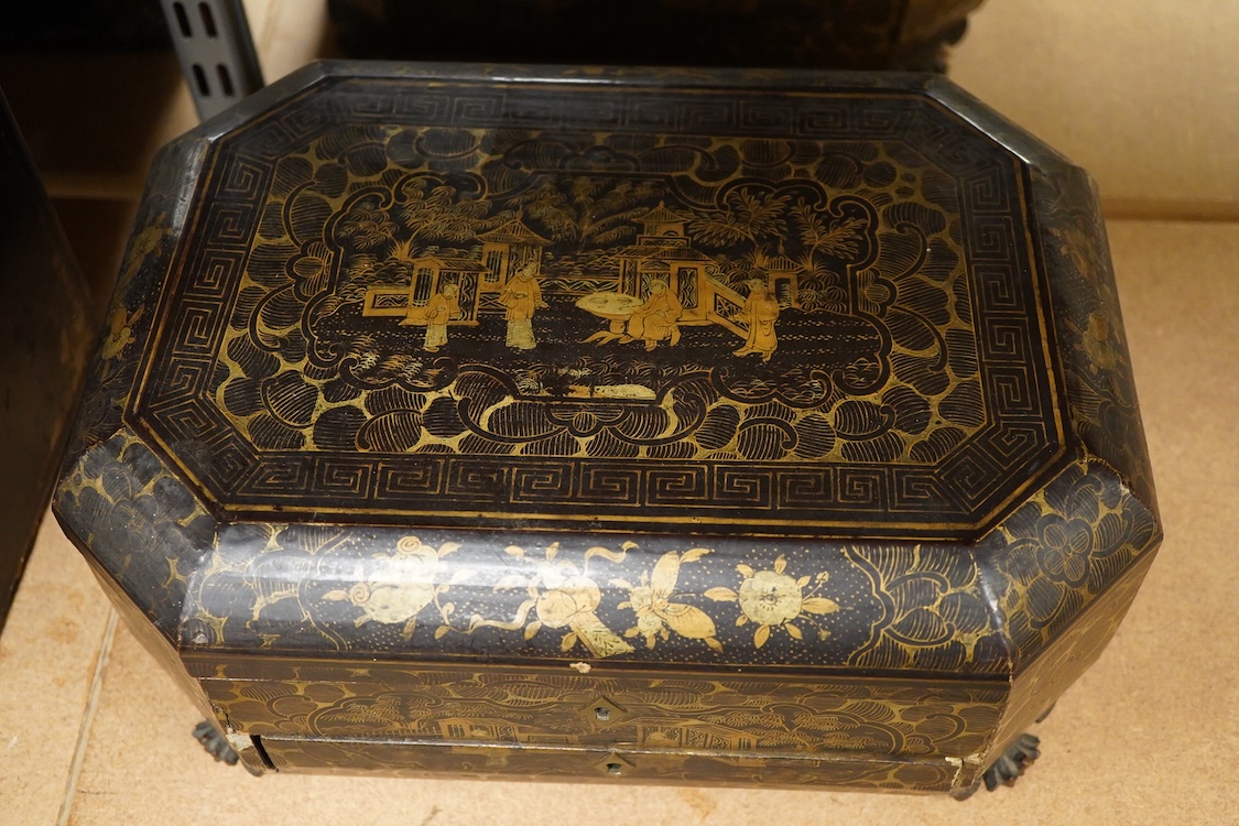 Three 19th-century Chinese gilt-decorated black lacquer sewing boxes, two containing bone sewing accessories, together with a similar tea chest (4) largest box- 33.3cm wide x 20cm high